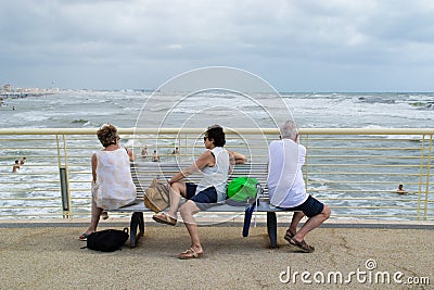 Seniors sitting on the bench Editorial Stock Photo